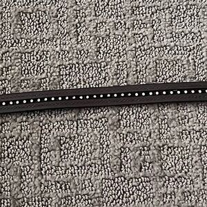 Then brown leather equestrian belt with rhinestones that go all the way around.